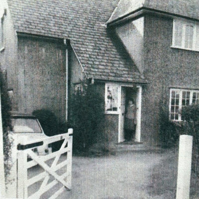 Margaret standing in the doorway of her first house in Duncombe Road, Hertford