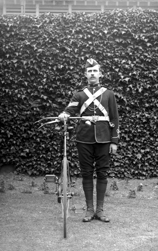 Portrait of Officer with Bicycle
